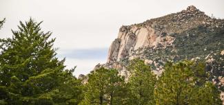 Sheer rock face on mountain.