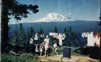 Rose and her three younger siblings doing laundry at Fire Lookout.