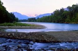 the sun sets on the skagit and illabot creek wild and scenic river system