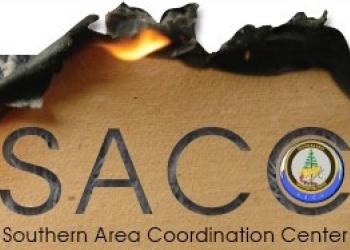 Southern Area Coordination Center logo of piece of cardboard on fire