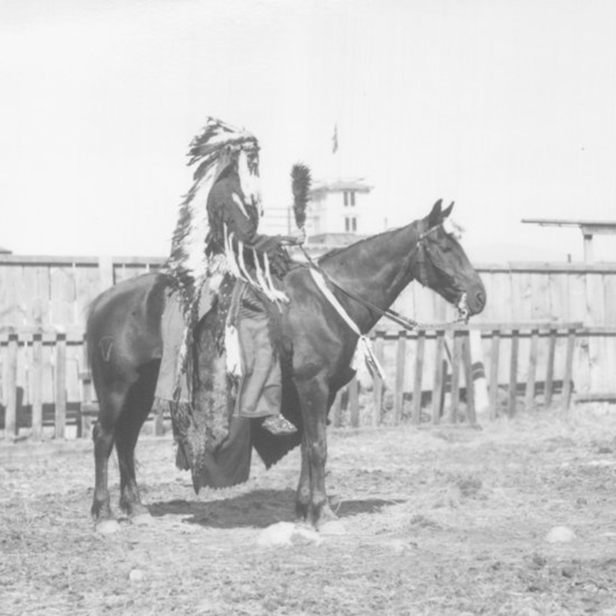 tribal member of horseback