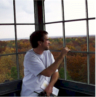 dave morris in fire tower on autumn day