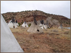Teepees on a wilderness film set.