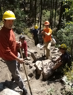 Volunteers working on a trail in the Coconino Forest