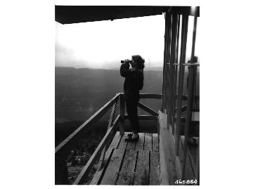 Lookout Dorothy Lynch viewing terrain from Sisi Butte Lookout, 6 ft. tower in Mt Hood N.F.