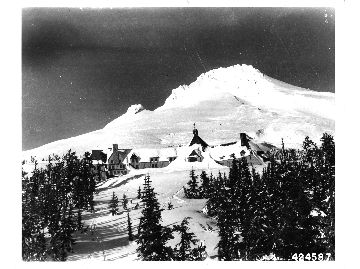 Timberline Lodge and Mount Hood under blanket of snow during the winter of 1942-43 when the Lodge was closed because of war conditions.