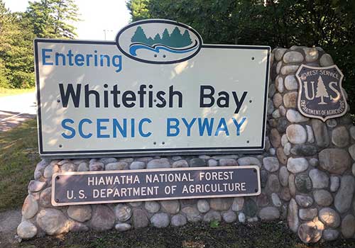 Whitefish Bay Scenic Byway entrance sign
