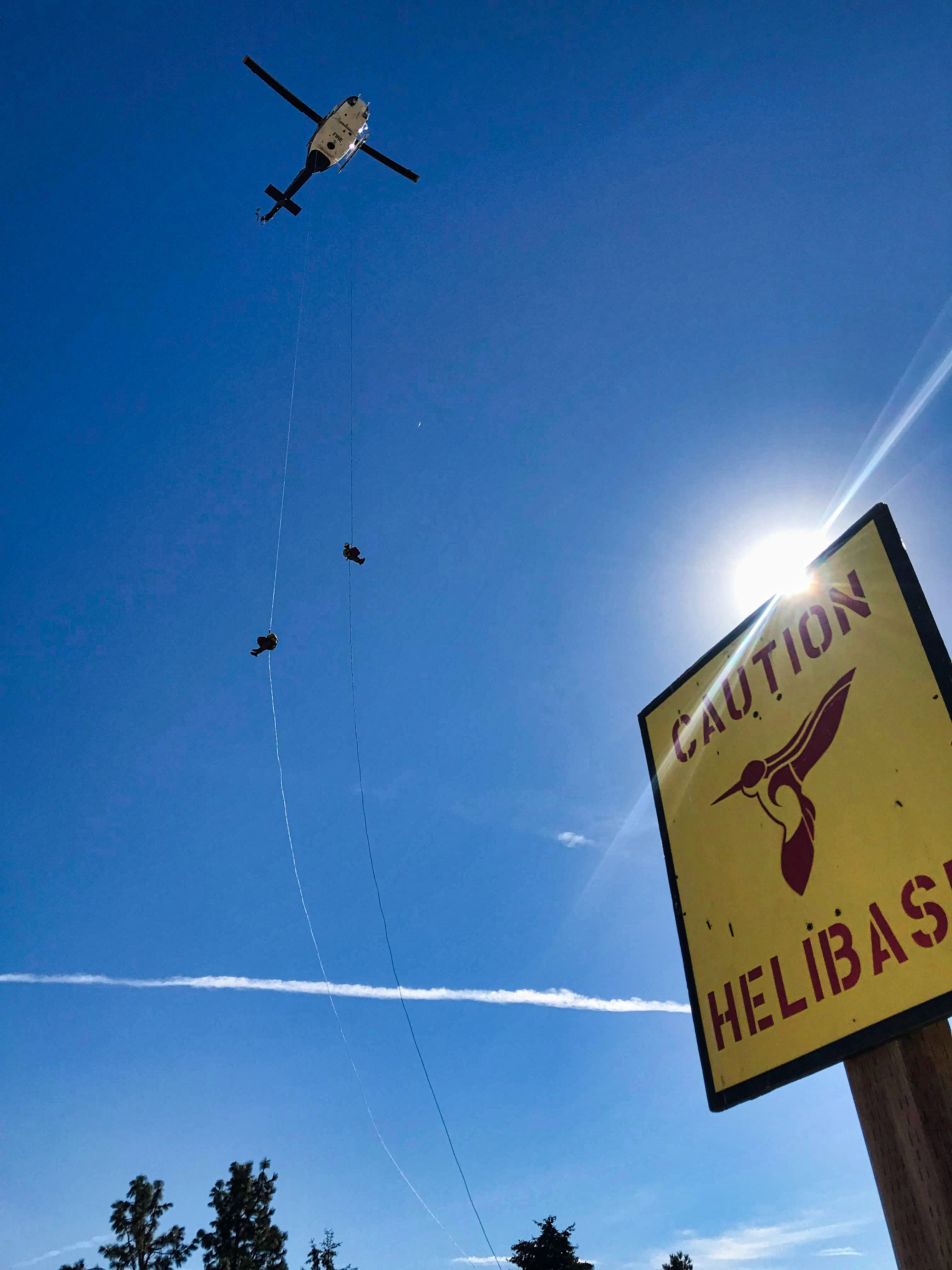 Rapellers with airbase sign