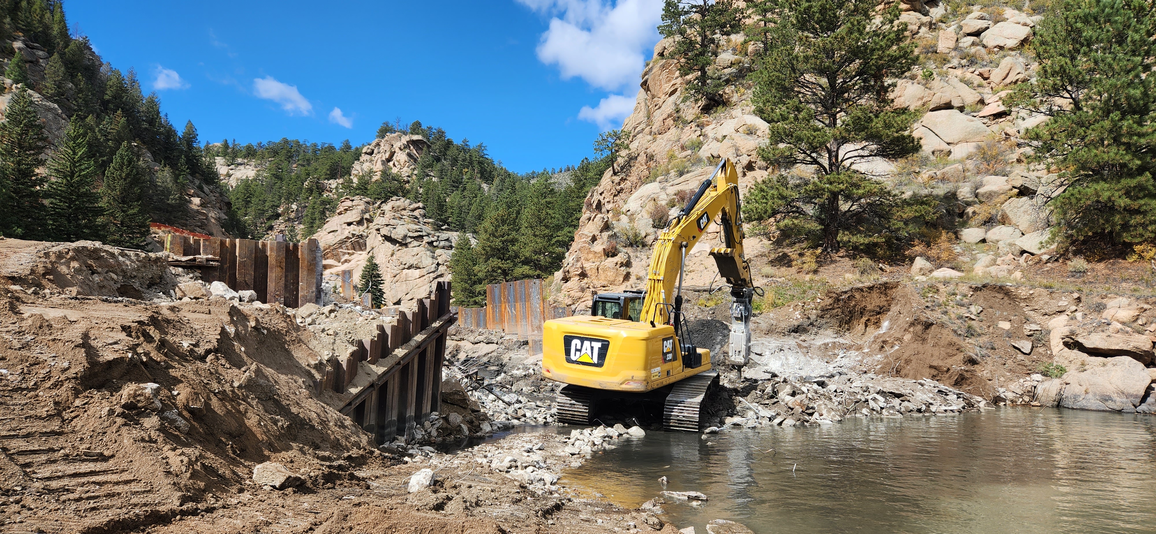 Construction equipment dismantling Lake George Dam
