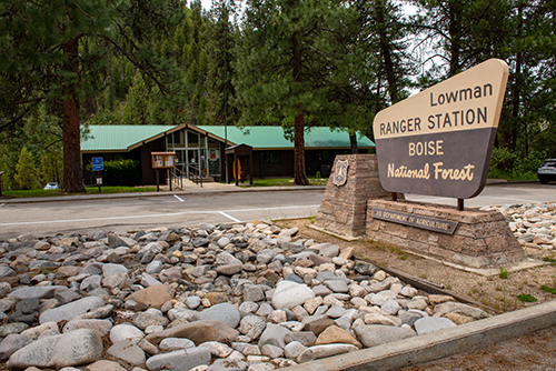 Ranger district sign with building