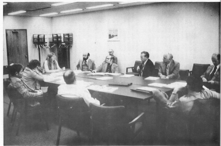 Historic photo of a meeting of the early Steering Committee and Study Team