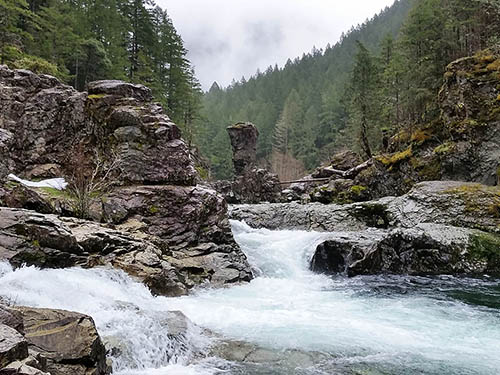 A view from Three Pools Day Use Area with the North Fork of the Santiam River rushing over the rocks