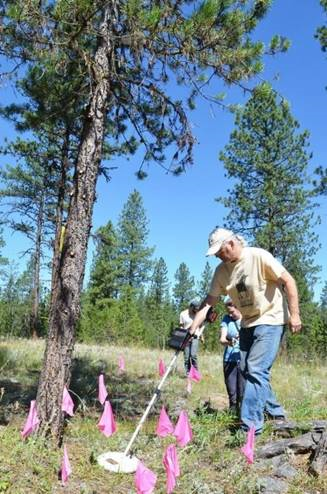Don Hann and volunteers use metal detector survey to identify potential sites