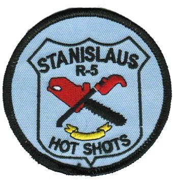Inmage of an embroidered patch depicting two crossed chainsaws