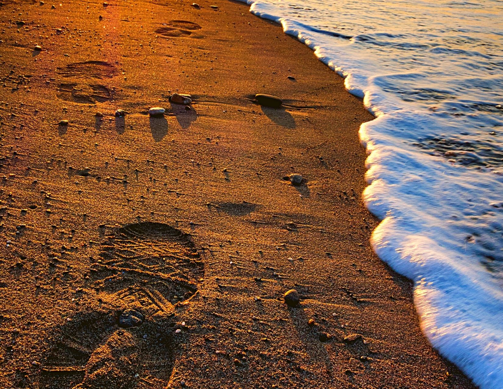 Outdoor Ethics footprints in sand