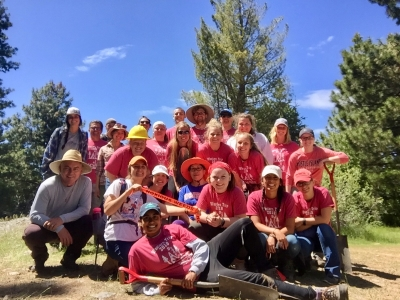 Tuolumne River Trust Volunteers with the Stanislaus National Forest stand in a group together