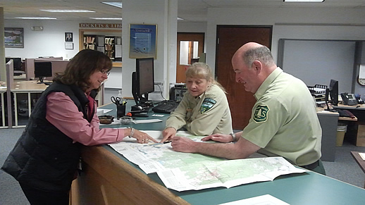 Public Lands Information Center Personnel Helping Customer