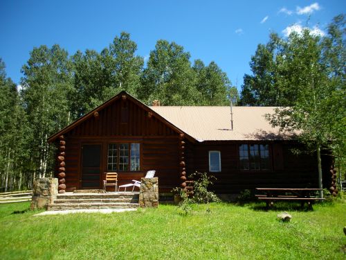 photo of cabin in  summer
