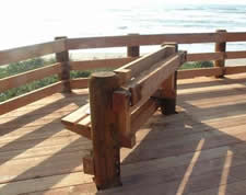 Viewing platform with wooden bench looking facing toward the Pacific Ocean 