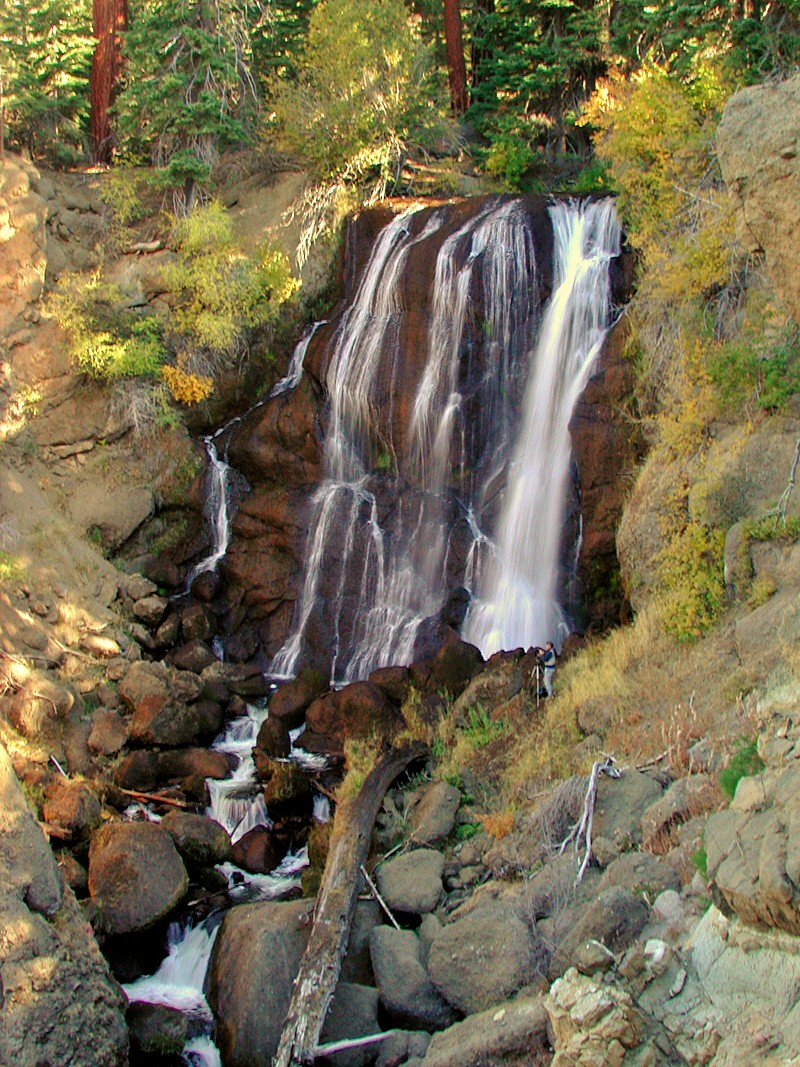 Thin ribbons of water drop a hundred feet onto rocks below Mill Creek Falls.
