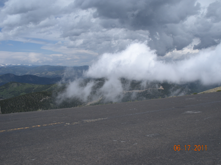 Clouds rolling in at mile marker 5, giving drivers the illusion of driving above the clouds.