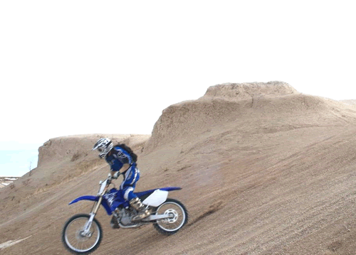 Dirt bike rider in a designated riding area in the Pawnee National Grassland, located in northeastern Colorado