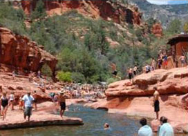 Slide Rock pools showing a lot of people using the area