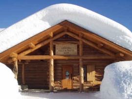 The Lolo Pass Visitor center covered in snow