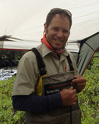 Image of Matt Fairchild wearing fishing waders.
