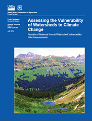 Image of the Assessing the Vulnerability of Watersheds to Climate Change publication cover with image of a forest landscape with mountain range.
