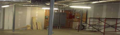 Photo of the interior of a building that is under construction.