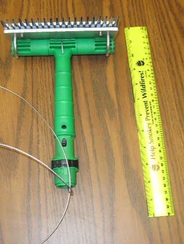 comb rake - perpendicular to pole alignment
