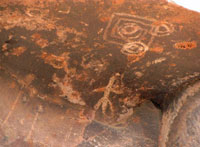 Petroglyphs carved into a rock. 