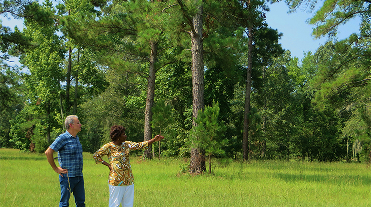 Forest Service researcher John Schelhas and landowner Eleanor Cooper Brown discuss her family’s land and forests. Forest Service photo by Sarah Hitchner.