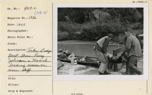 Taku Lodge Float. Grove, Lacey Johnson, & Haack loading moose on river skiff.