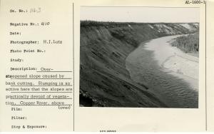 Over-steepened slope caused by bank cutting. Slumping is so active here that the slopes are practically devoid of vegetation. Copper River, above Copper Center. [Date estimated. Year is likely 1950, 1951, or 1957.]
