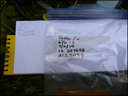 eDNA sampling envelope, bag, and rite in the rain notebook