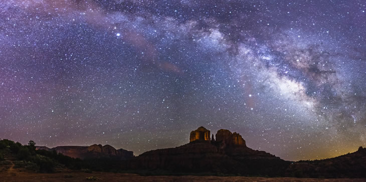 A picture, taken at night, showing the Milky Way over Cathedral Rock, seen from the Cathedral Rock Trailhead on Back O' Beyond Road, Coconino National Forest, Sedona, Arizona
