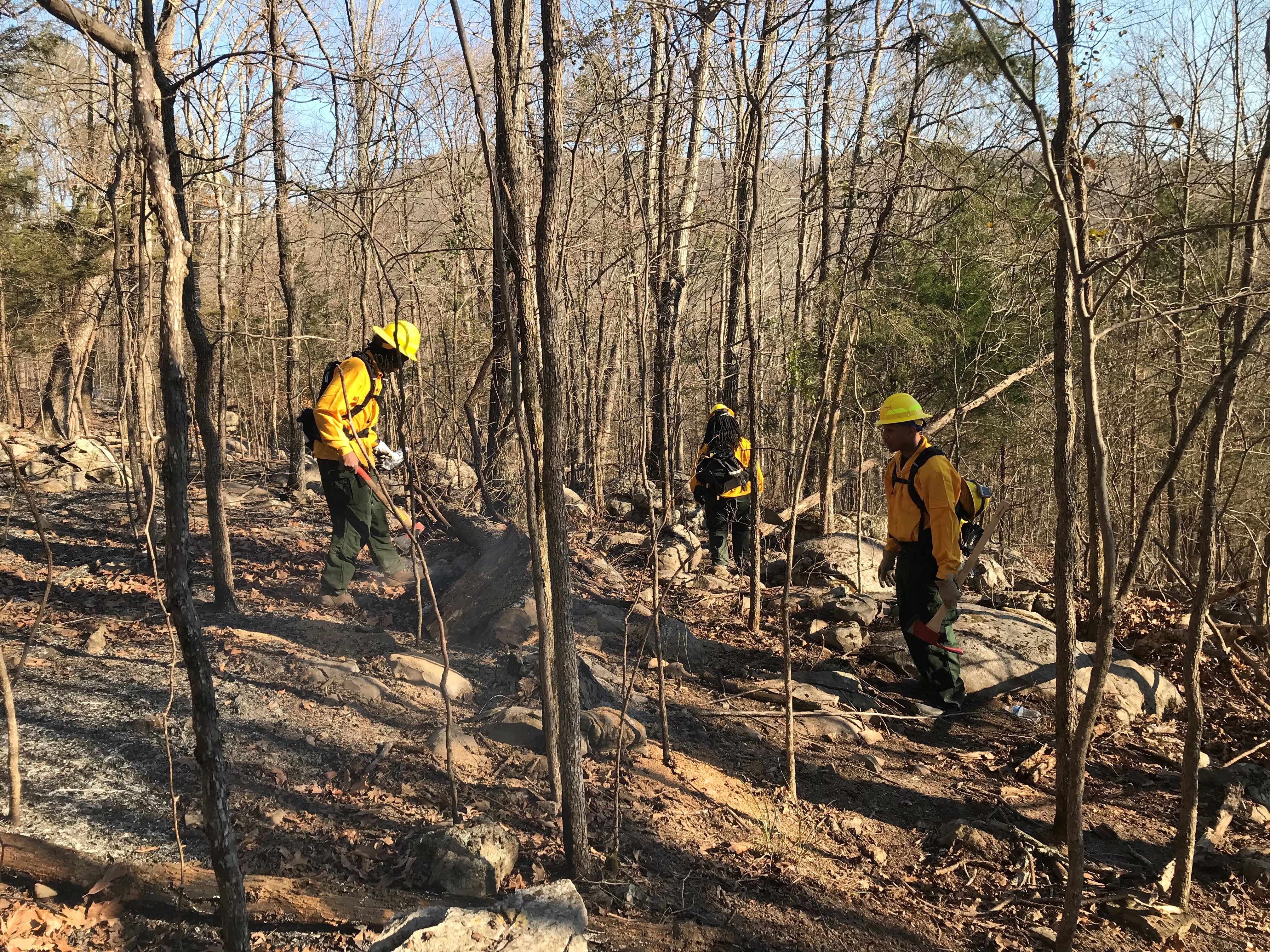 Alabama A&M University students helped the Alabama Forestry Commission patrol the fire edge for remaining hot spots after a wildfire at Keel Mountain in northern Alabama. 