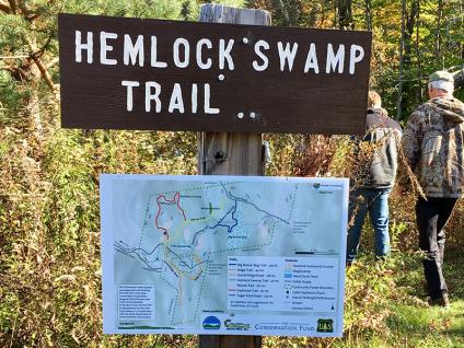 A recreational trail sign and map on the Poestenkill Community Forest.