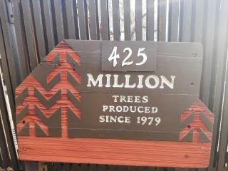 A picture of sign that says 425 million trees produced since 1979.
