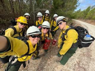 An all women wildland firefighting crew selfie