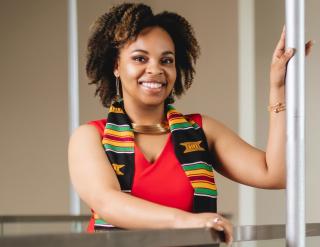 young African American female posing for graduation