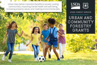 USDA Forest Service, Urban and Community Forestry Grants graphic showing children playing soccer. Subtext reads "Urban trees deliver important benefits to society; cooling communities, improving mental health and well-being, increasing property values, and creating environmental jobs."