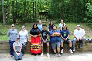 Indian Youth Service Corps students and adults pose for group picture.