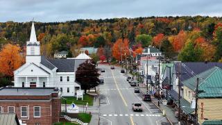 A small rural community surrounded by lush forest.