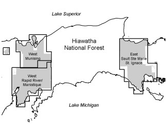A map showing the West Munising and West Rapid River/Manisique to the west of the Hiawatha National Forest and Ste Marie/ St. Ignace to the East.