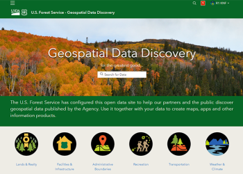 Screenshot of the Geospatial Data Discovery website.  Has large header graphic of a fall forest and links below to data