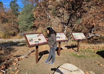 Chumash sign project three panels with visitor