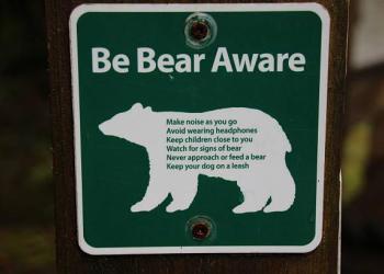 Be Bear Aware sign on a post.